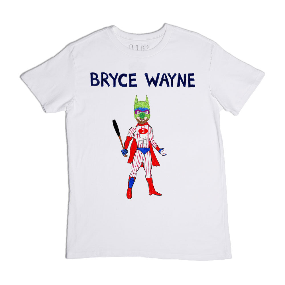 White t-shirt featuring a graphic of a cat-like superhero character dressed in a sports uniform, holding a baseball bat, with the text "bryce wayne" above it.