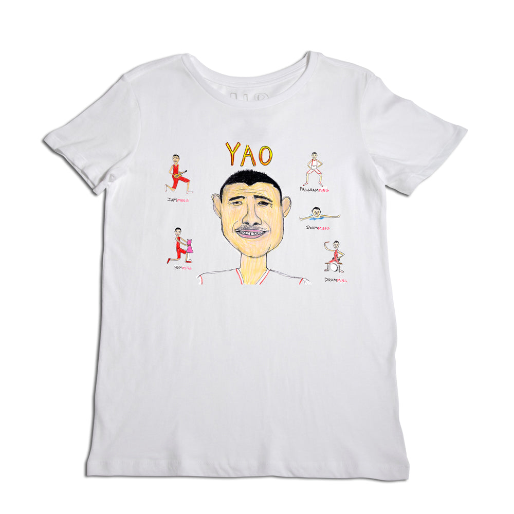 White t-shirt with a graphic of a man's face in the center, surrounded by small colorful illustrations of basketball players in various poses labeled with names like "yao," "shaq," and "dwane.