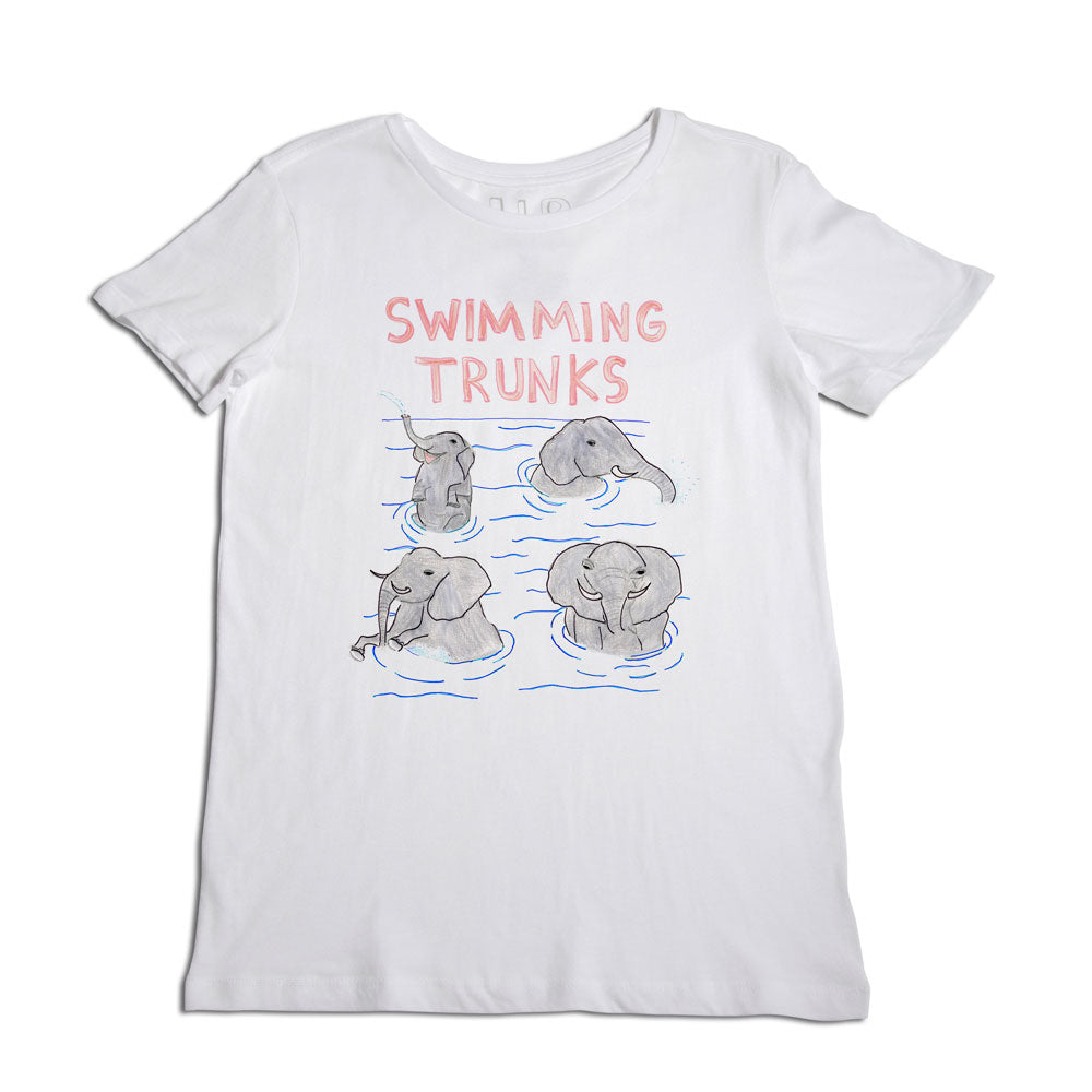 White t-shirt with a graphic of three elephants wearing swim trunks and goggles, aligned horizontally. above them, the phrase "swimming trunks" is printed in coral pink.