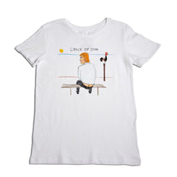 White t-shirt featuring an illustration of a man sitting on a bench, viewed from the back, with a rooster perched next to him under a rising sun labeled "crack of don.