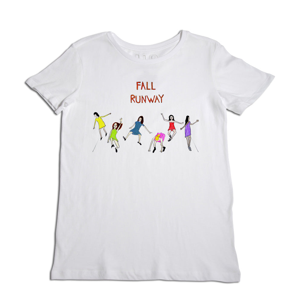 White t-shirt with a design featuring colorful illustrations of diverse female runway models in motion and the text "fall runway" printed above them.
