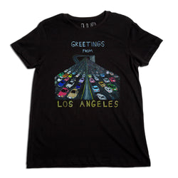 Black t-shirt with a colorful graphic of cars on a freeway forming a fan shape. text says "greetings from los angeles.