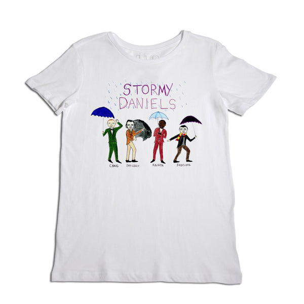 White t-shirt with a colorful illustration of four figures under umbrellas and the text "stormy daniels" above them.