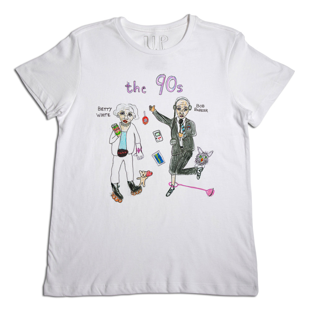 White t-shirt featuring colorful illustrations of two elderly celebrities dressed in vibrant '90s fashion, with references to '90s pop culture elements. the shirt includes text labels with the names "betty white" and "bob barker.