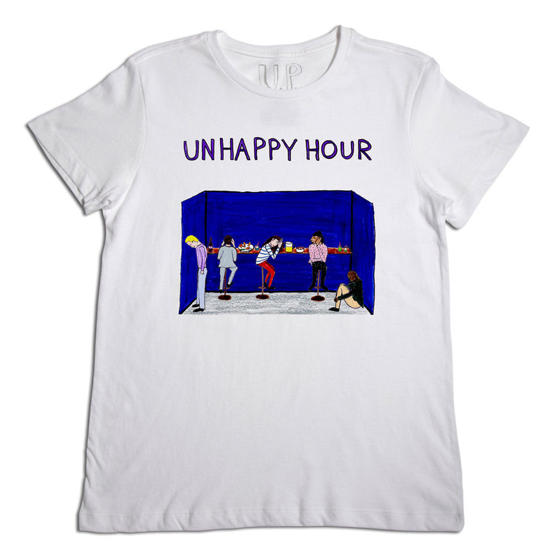 A white t-shirt with a graphic depicting a group of people in a dark room with the words "unhappy hour" in bold lettering above the scene.