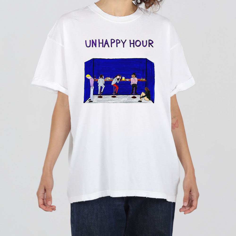 A person wearing a white t-shirt with the phrase "unhappy hour" above a graphic of several figures in a bar setting, displayed against a dark blue background.