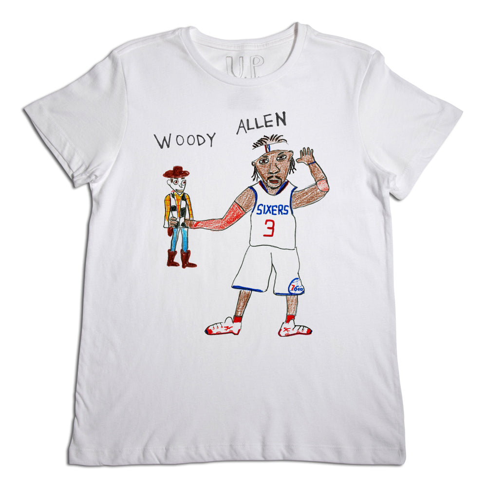 White t-shirt with a cartoon illustration featuring woody from toy story and a basketball player wearing a sixers jersey numbered 3, holding hands.