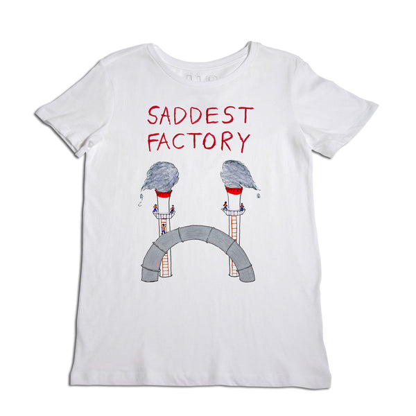 White t-shirt with a whimsical design featuring a grey arch labeled "saddest factory" and two illustrated figures with cloud heads, shedding tears, positioned at each end of the arch.